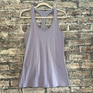 Lululemon tank top with cool small cutout slits down back. Color is a lg violet